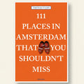 Book cover of '111 Places in Amsterdam That You Shouldn't Miss' by Thomas Fuchs with an orange background and red shoes illustration.