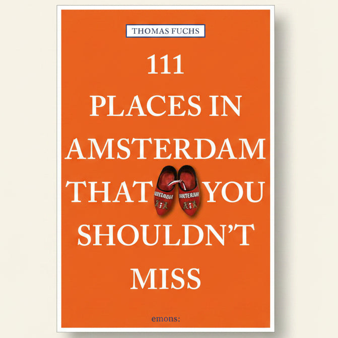 Book cover of '111 Places in Amsterdam That You Shouldn't Miss' by Thomas Fuchs with an orange background and red shoes illustration.