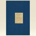 Book cover with beige label on a blue background