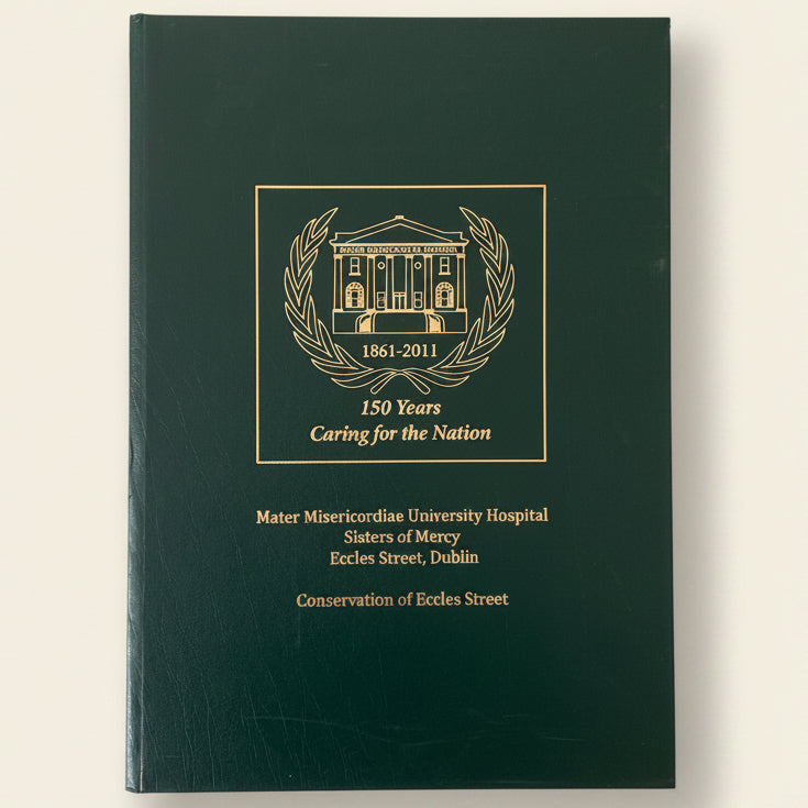 Green book with gold text and logo on a white background