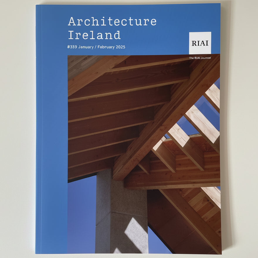 Architecture Ireland journal, February 2026 issue, featuring a blue cover with white text and a photograph of wooden architectural beams and columns.