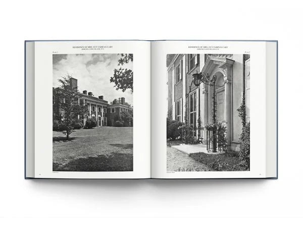 An open vintage book or magazine spread, showing two black-and-white architectural photographs of a large mansion from different angles, photographed against a clean white background.