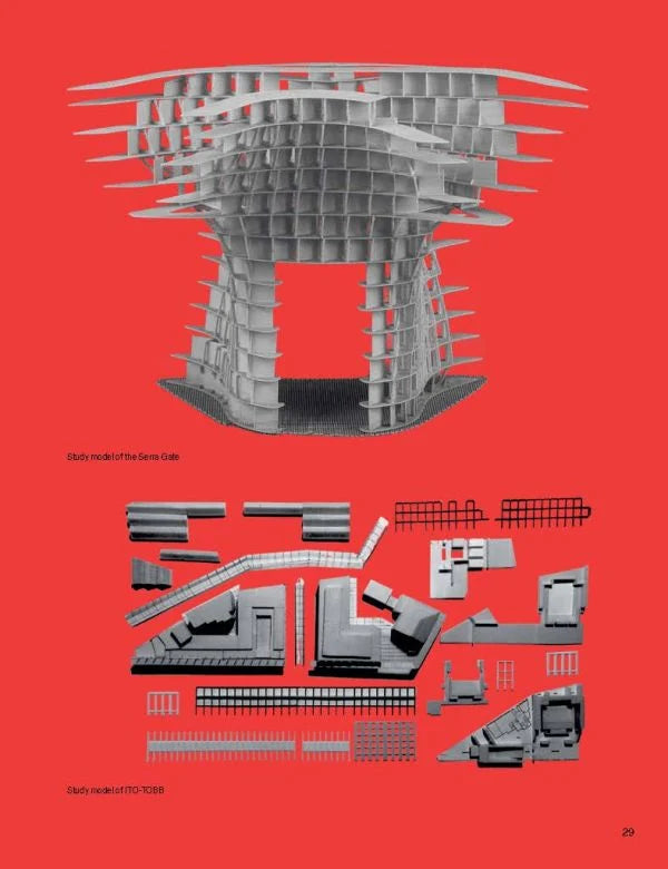 An architectural model kit display featuring a large gray 1/12 scale model of the Tokyo Metropolitan Museum of Modern Art on a bright red background, with smaller gray model components arranged below.