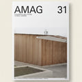 Cover of AMAG magazine featuring a modern building with wooden facade
