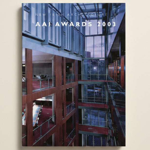 Modern architectural interior with glass walls and red accents, featuring text 'New High Architecture & AIA Awards 2003'.