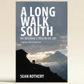 Book cover of 'A Long Walk South' with a mountain landscape and silhouette of a person.