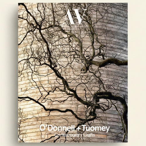 Book cover with tree branches against a textured wall and 'AW' logo.