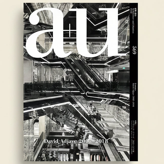Cover of a book titled 'au' with a black and white design of a cityscape.