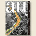 Cover of a magazine titled 'AU' featuring an illustration of a bicycle path on a city street.