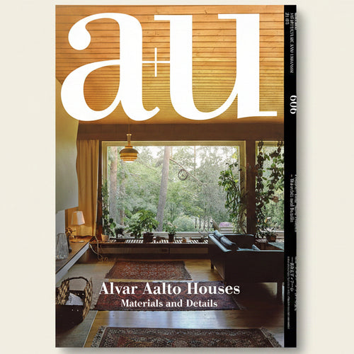Cover of a magazine featuring a modern interior design with large windows and Alvar Aalto Houses text.