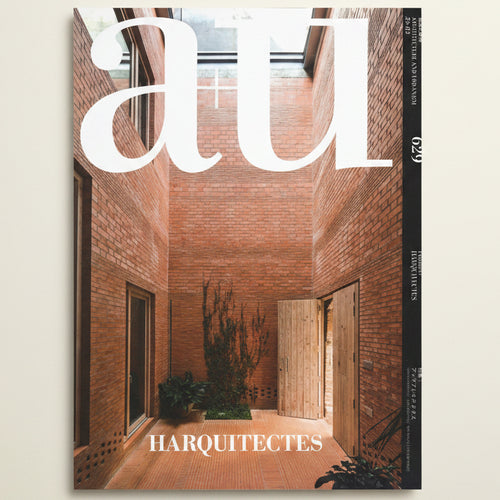 Cover of a magazine featuring a modern architectural interior with 'au' branding.