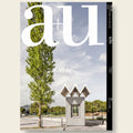 Cover of a magazine with a modern building and tree, featuring the logo 'au'.