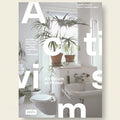 Book cover of 'Activism at Home' with a bathroom interior and plants.