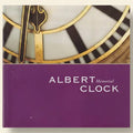 Close-up of a clock face with 'Albert Memorial Clock' text on a purple background