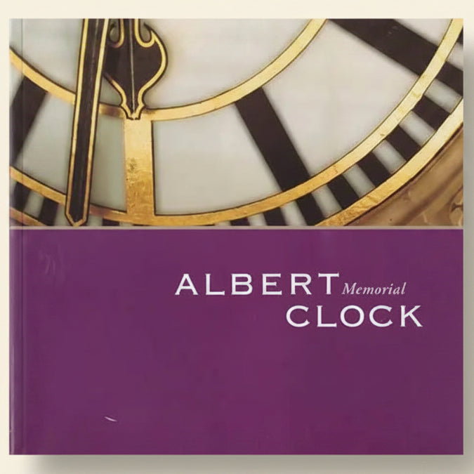 Close-up of a clock face with 'Albert Memorial Clock' text on a purple background