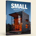 Book cover of 'Small Architecture Now!' by Taschen with a modern building at night.