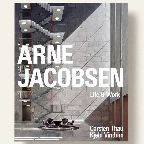 Book cover of 'Arne Jacobsen: Life & Work' with architectural design and text.