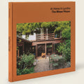 Book cover with an image of a garden and text 'At Home in London The Mews House' on a white background