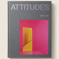 Book cover with 'Attitudes' text and a pink and yellow door design.