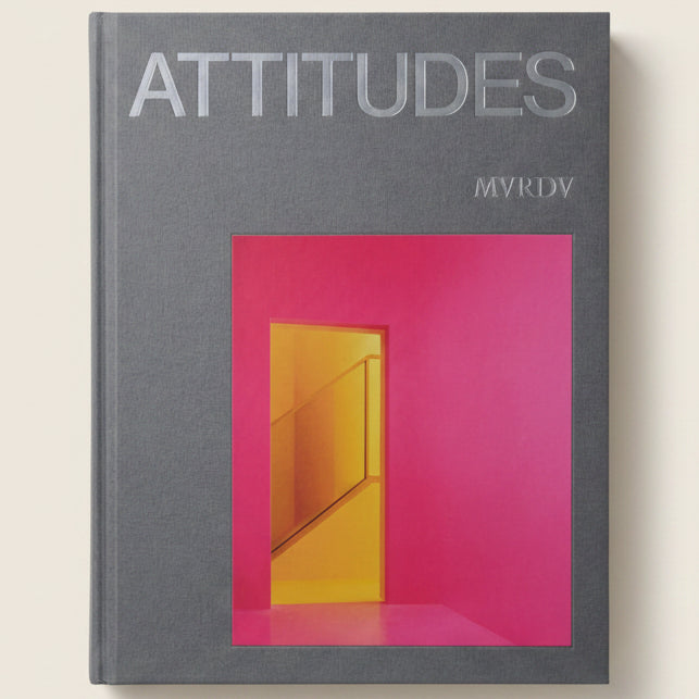 Book cover with 'Attitudes' text and a pink and yellow door design.