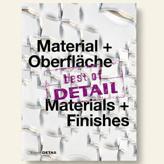 Book cover with text 'Material + Oberfläche best of DETAIL Materials + Finishes' on a textured white background.