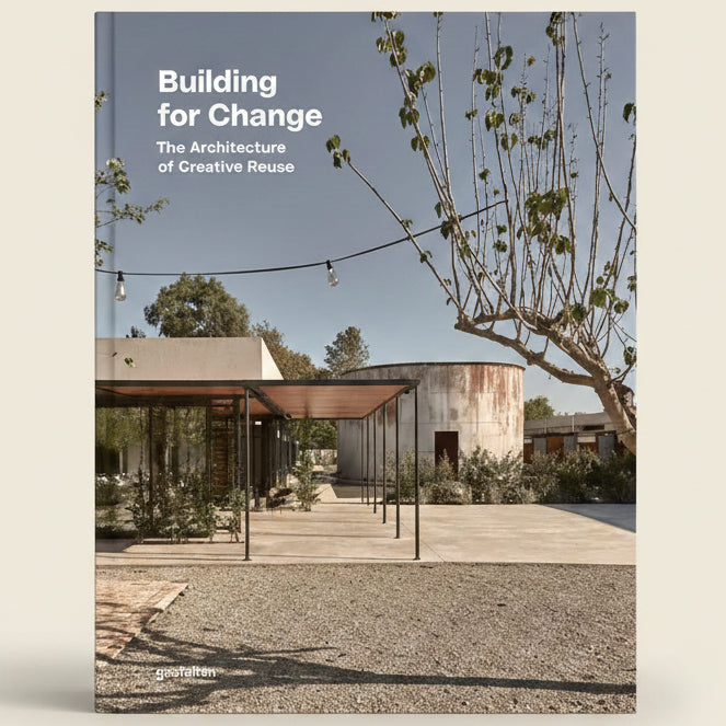 Book cover of 'Building for Change: The Architecture of Creative Reuse' with a modern building and tree in the background.