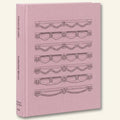 Pink book with black line drawings on a white background