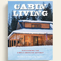 Book cover of 'Cabin Living' with a snowy cabin and trees in the background