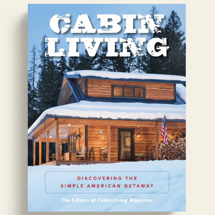 Book cover of 'Cabin Living' with a snowy cabin and trees in the background