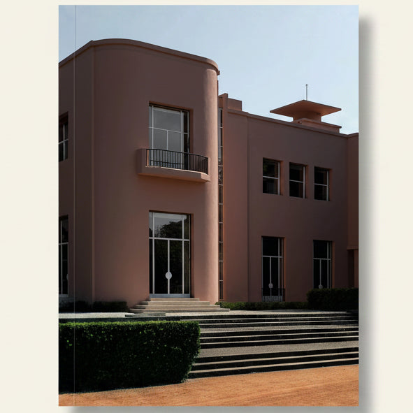 Modern architectural building with curved design and steps leading up to it.