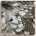 Landscape architecture project with stone and concrete elements, featuring text about Dermot Foley Landscape Architects.