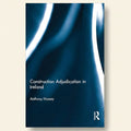 Book cover of 'Construction Adjudication in Ireland' by Anthony Hussey with a blue and white design.