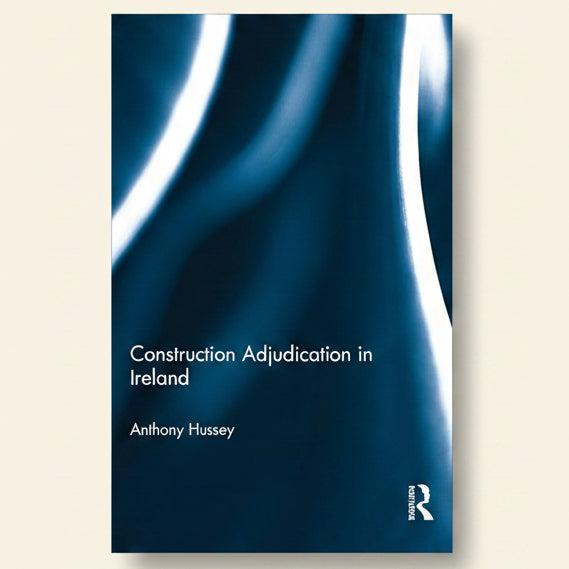 Book cover of 'Construction Adjudication in Ireland' by Anthony Hussey with a blue and white design.