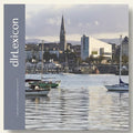 Book cover of 'dlr lexicon' with a harbor scene featuring boats and buildings.