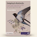 Book cover of 'Designing for Biodiversity' with a bird and houses illustration on a beige background