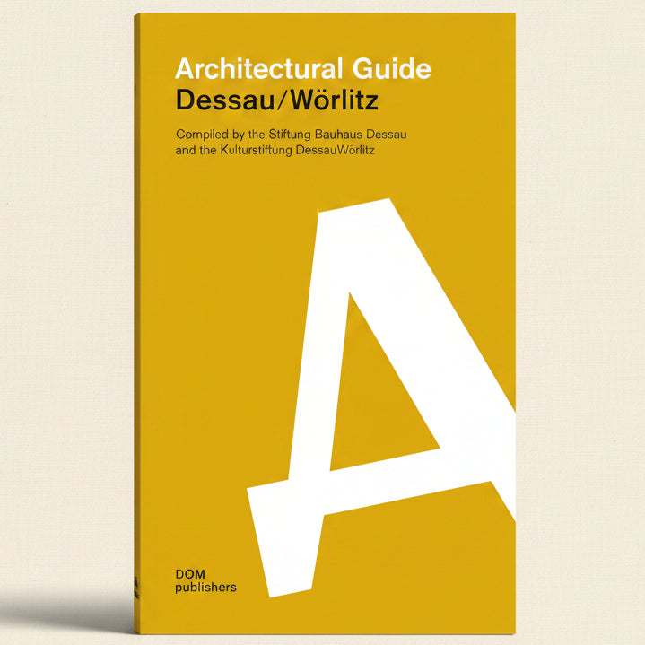 Book cover of 'Architectural Guide Dessau/Wörlitz' with a large white letter 'A' on a yellow background.