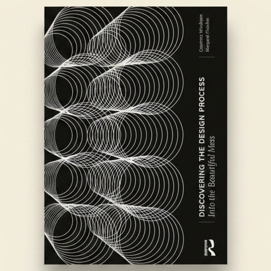 Book cover with abstract design and text 'Discovering the Design Process' by Robert A. Ventola