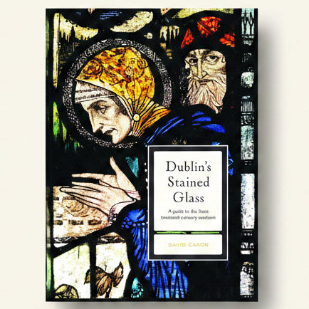 Book cover of 'Dublin's Stained Glass' with stained glass design elements.