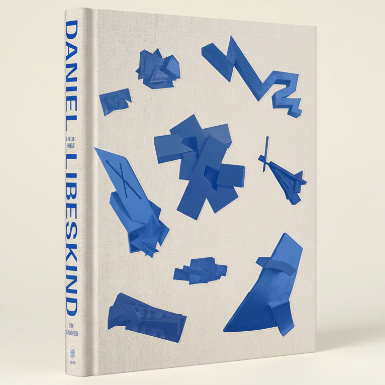 Book cover with blue geometric shapes on a beige background