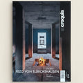 Cover of a magazine featuring an interior design with a fireplace and text about Pezo von Ellrichshausen.