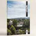 Cover of 'El Croquis' magazine featuring a modern building surrounded by trees and mountains.