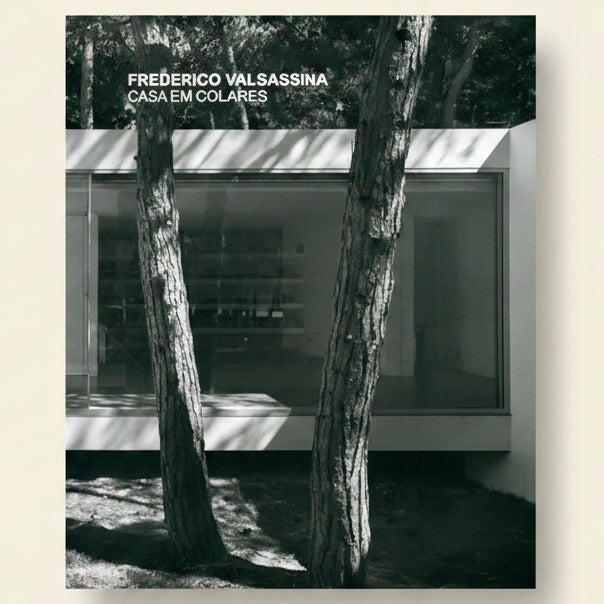Modern building with trees in front and 'Frederico Valsassina Casa em Colares' text above.