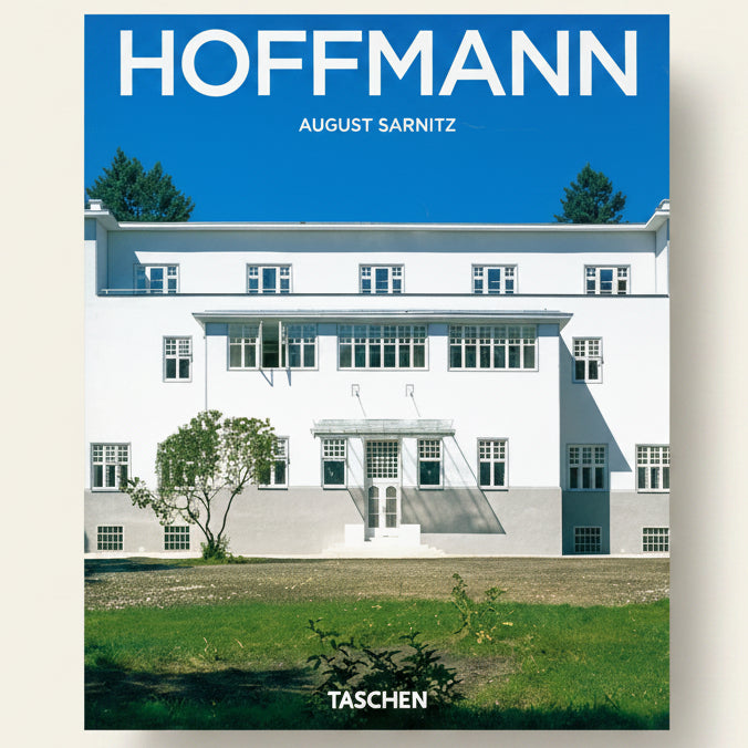 Book cover of 'Hoffmann' by August Sarnitz with a modernist building and blue sky.