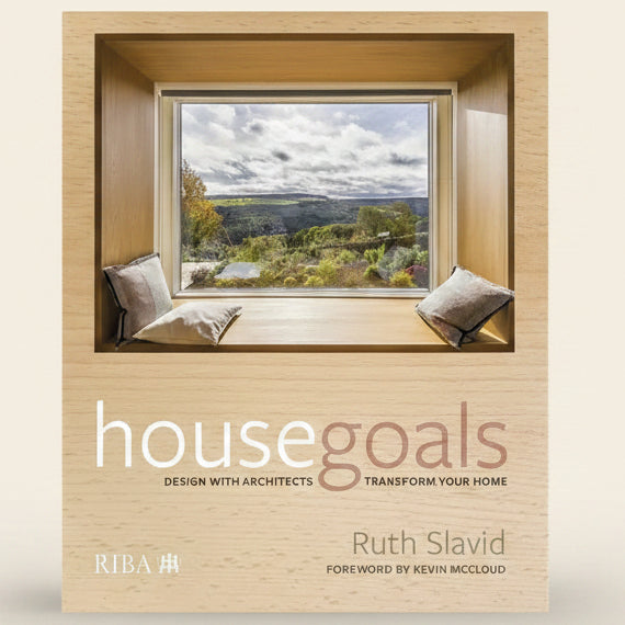 Book cover of 'housegoals' by Ruth Slavid with a window view of a landscape.