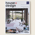 Magazine cover of 'house+design' on a marble surface