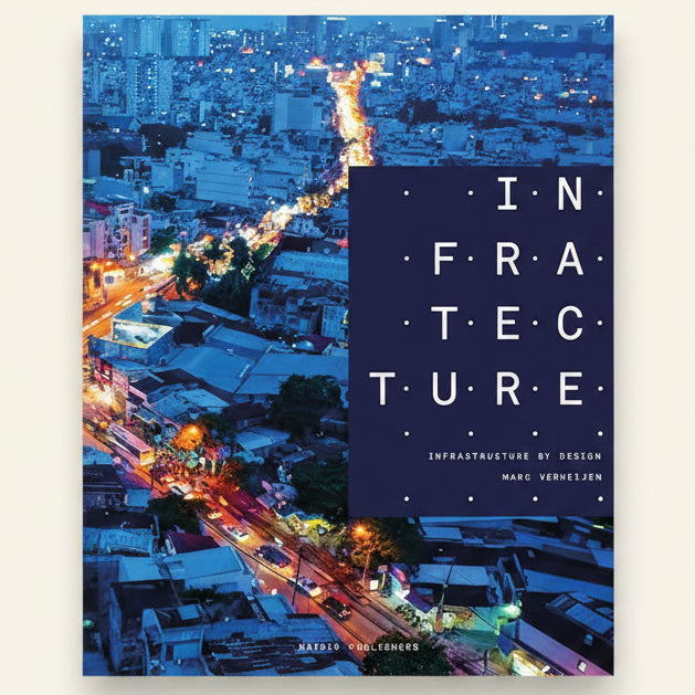 Cityscape at night with 'Infrastructure' book cover overlay