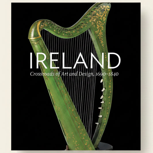 Decorative green harp with 'IRELAND' text on a black background