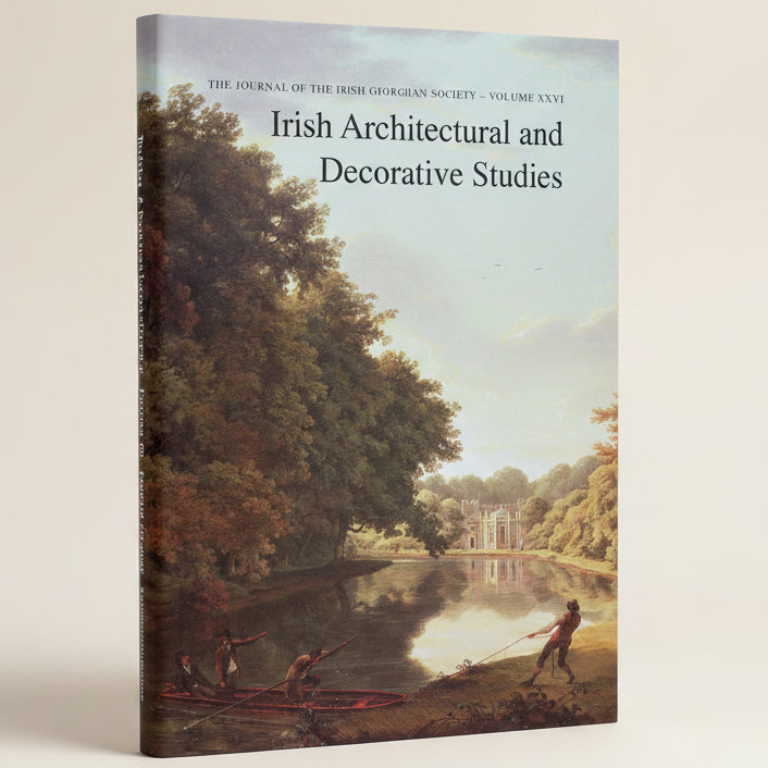 Book cover of 'Irish Architectural and Decorative Studies' with a painting of a landscape and people by a lake.