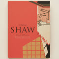 Book cover of 'Judging Shaw' with geometric design elements on a red background