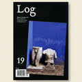 Magazine cover titled 'Log' with stone sculptures against a blue background
